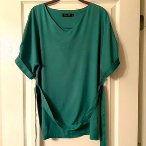 Amaryllis short sleeve linen shirt, w/a tie belt. More of a Kelley green color.